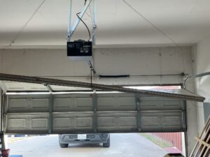 Broken Garage Door, off track, stuck in Wylie, Texas
