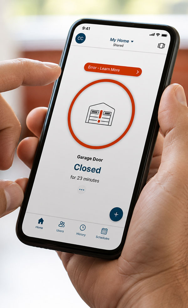 Man using the LiftMaster myQ smartphone app to monitor the status of a residential garage door remotely.